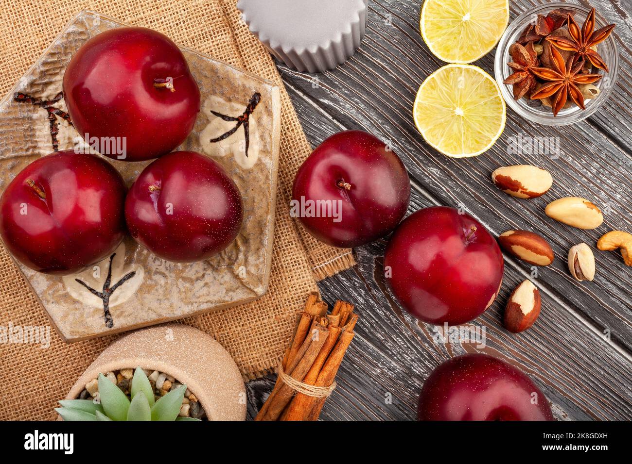 plum group on wood background top view Stock Photo