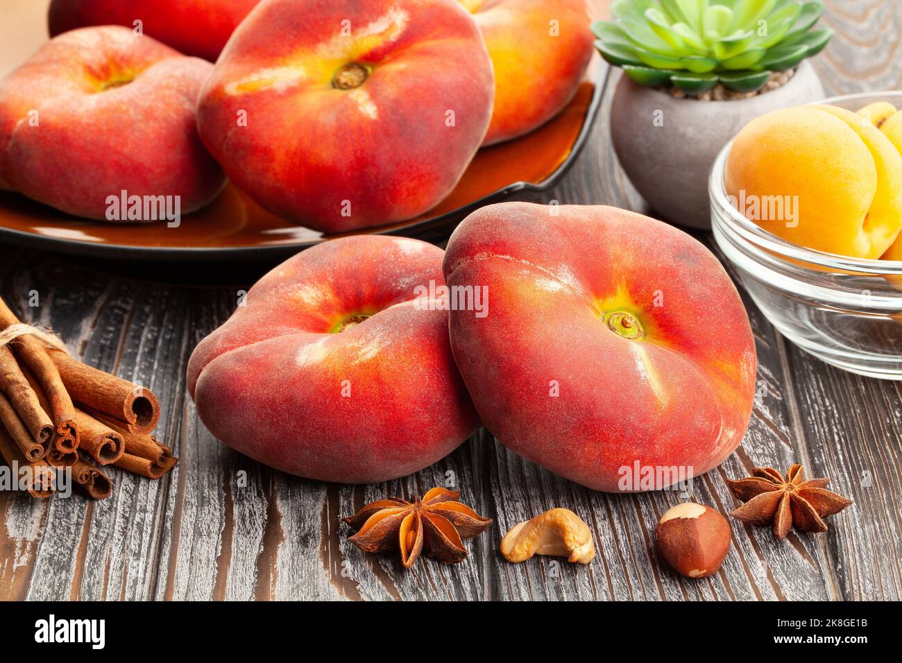 flat peach on wood background Stock Photo
