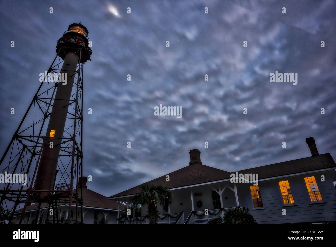 The late evening sky takes a blue hue behind the Sanibel Lighthouse and ...