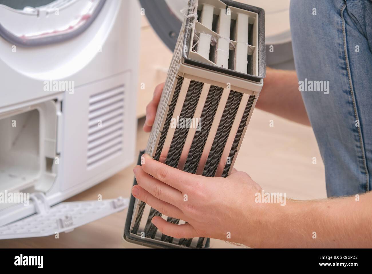 Drying machine with a full filter of lint, hair, dust, wool after the
