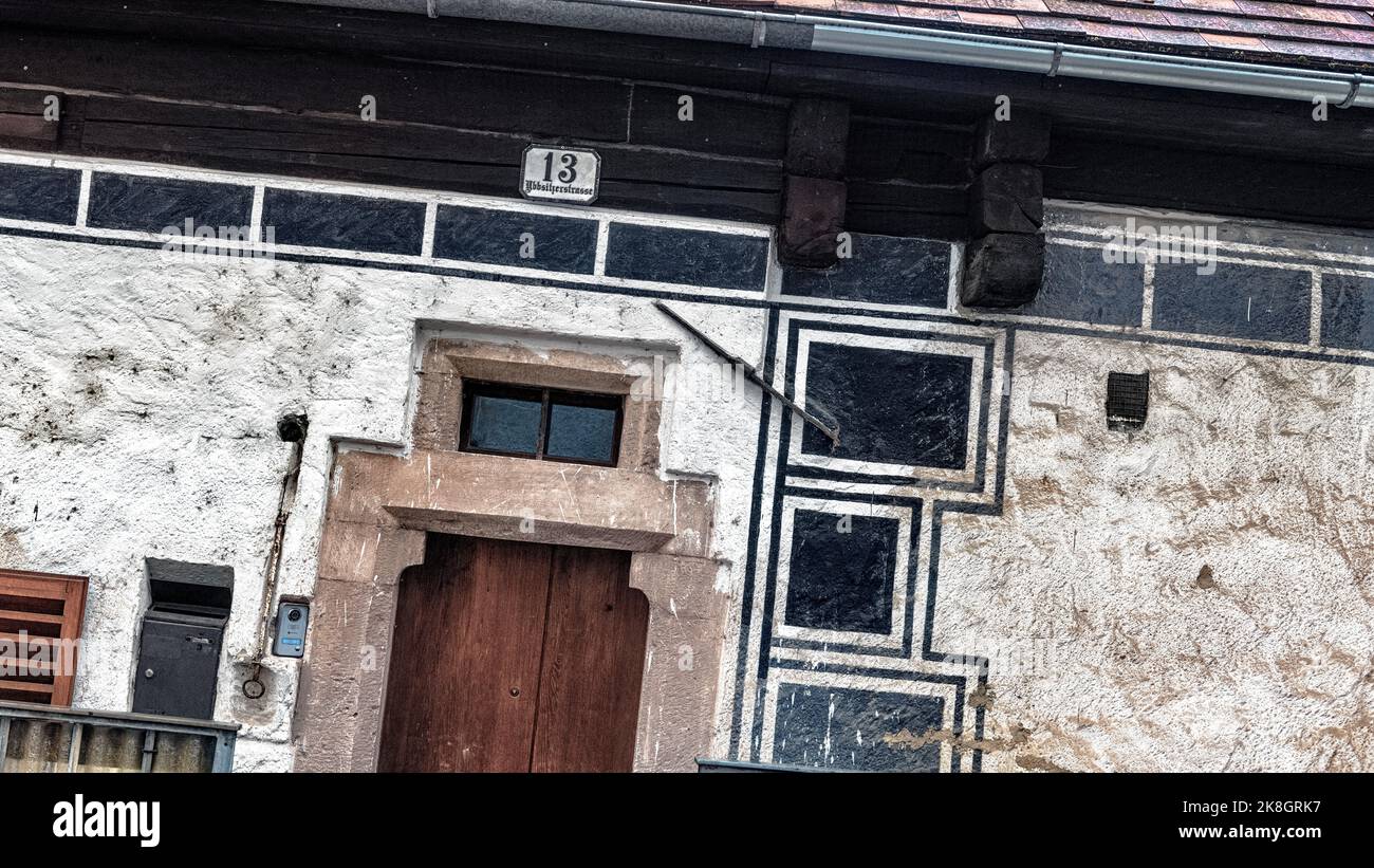Facade of a historic house in old town with window and door Stock Photo ...