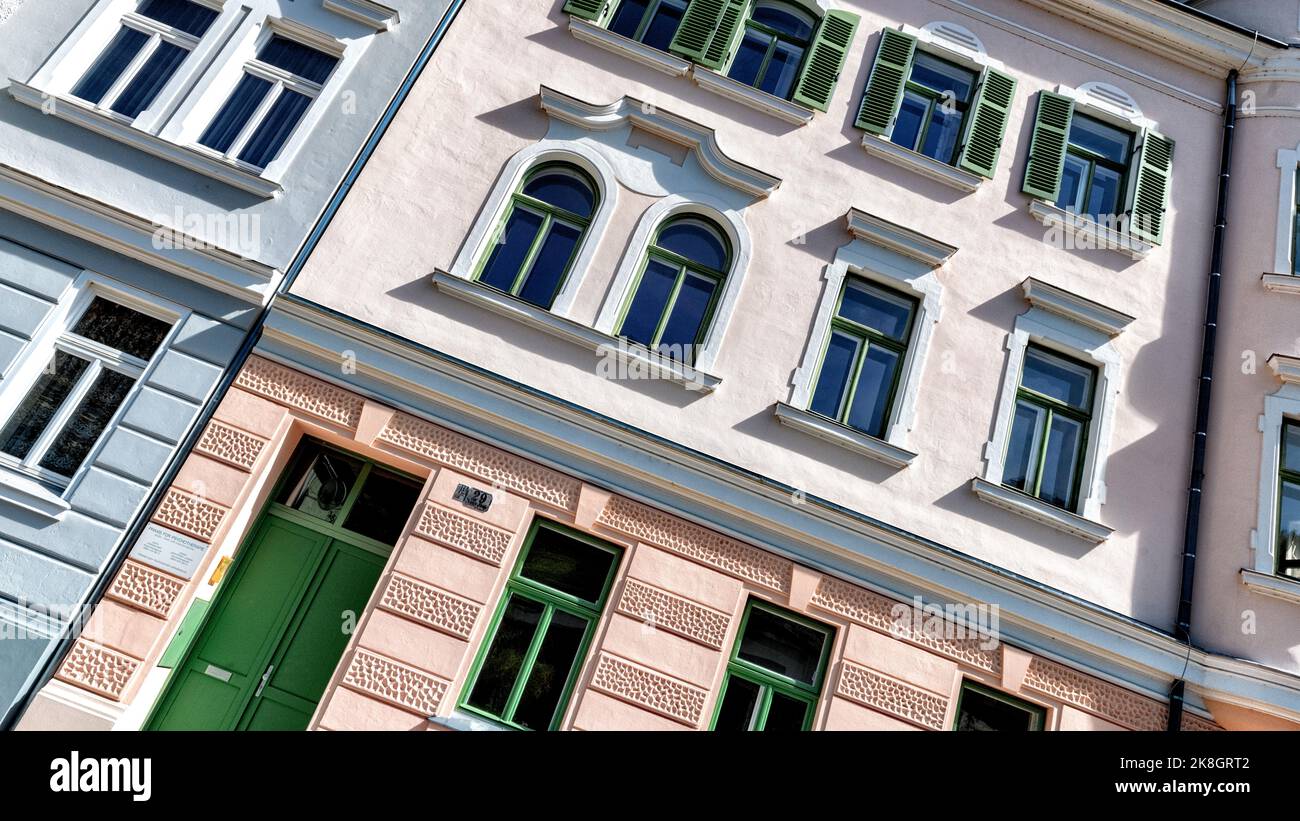 Facade a old house in town with windows and door Stock Photo - Alamy