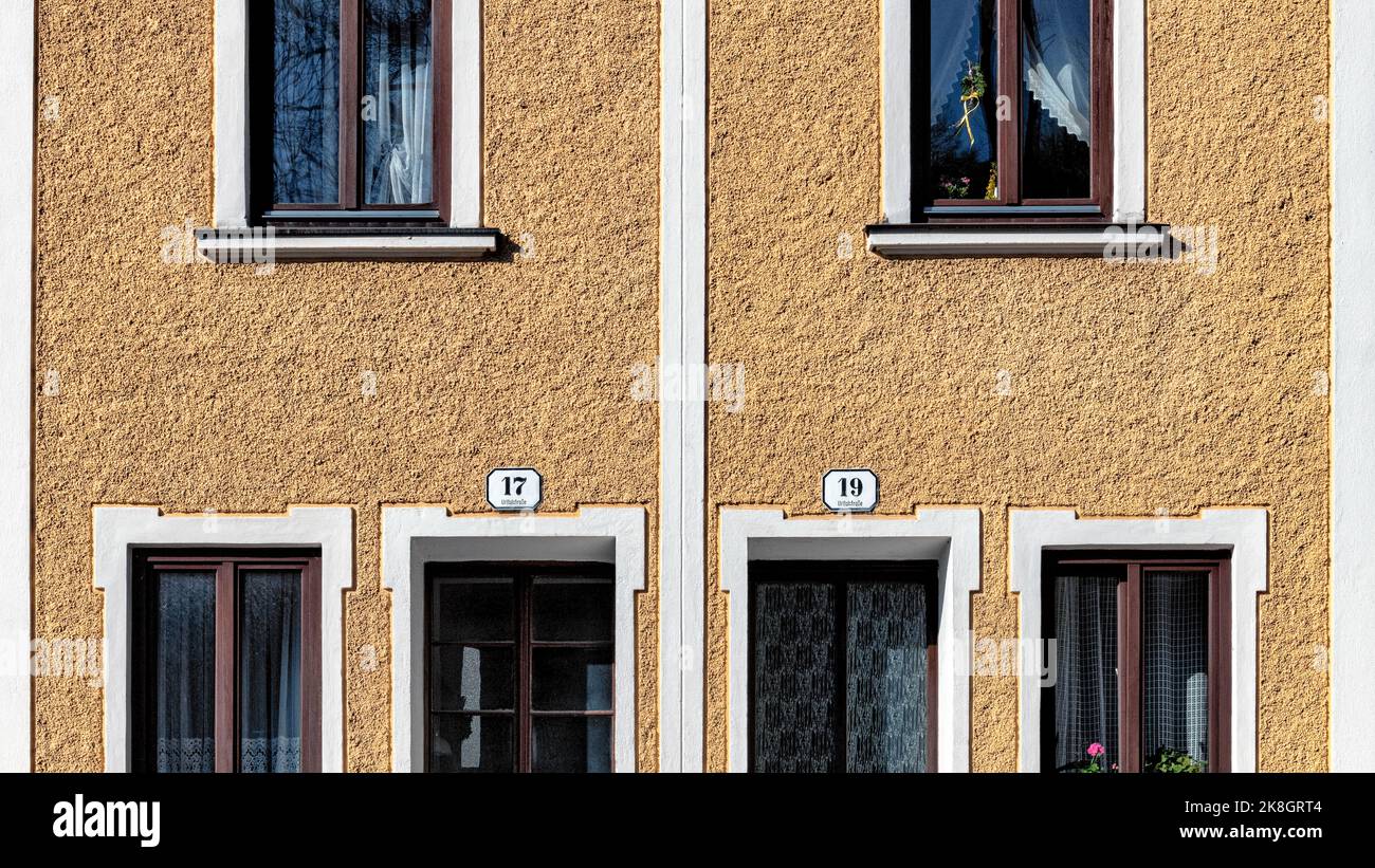 Facade a old house in town with windows and door Stock Photo - Alamy