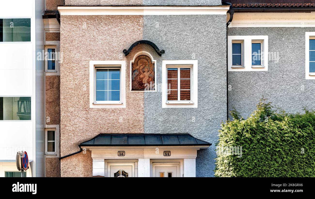 Facade a old house in town with windows and door Stock Photo - Alamy