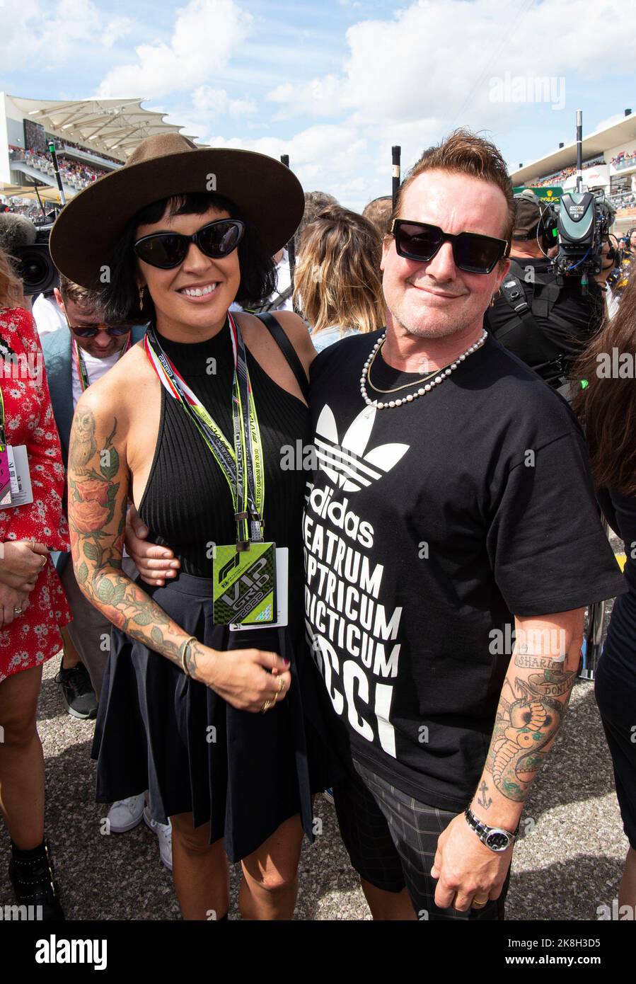 October 23, 2022, Austin, Texas, U.S: Green Day Drummer TRE COOL and girlfriend on the grid at Circuit of the Americas. (Credit Image: © Hoss McBain/ZUMA Press Wire) Stock Photo