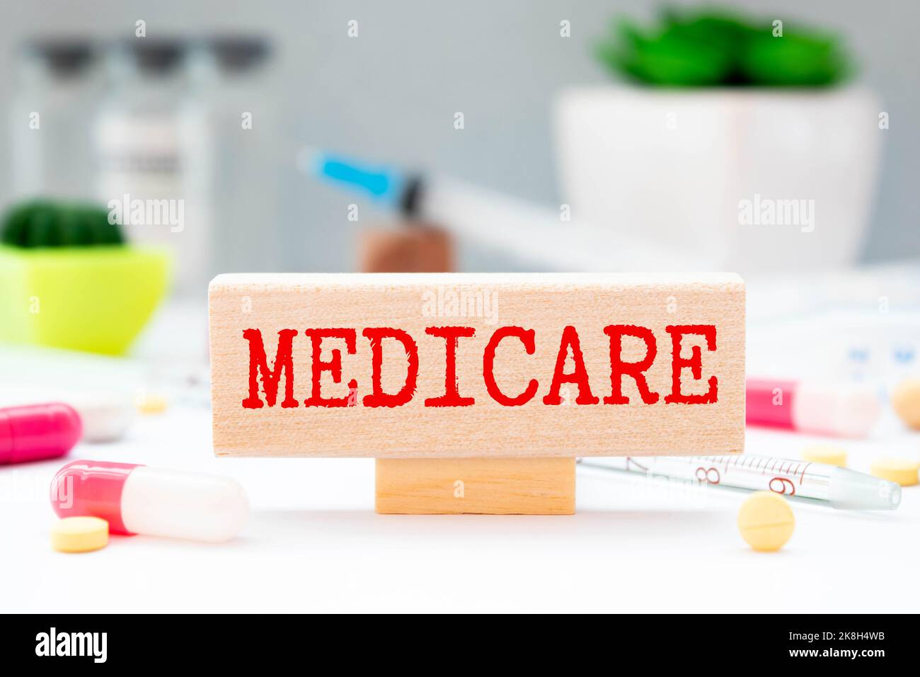 Word writing text Medicare. Business concept for Federal health insurance for people above 65 or with disabilities Multiple sticky cards pinned coclou Stock Photo