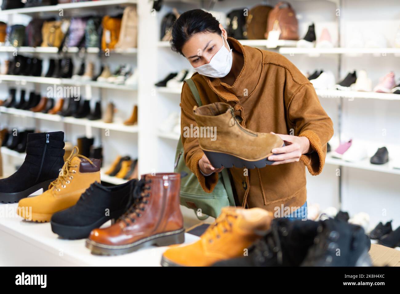 Woman wearing leather mask hi-res stock photography and images - Alamy