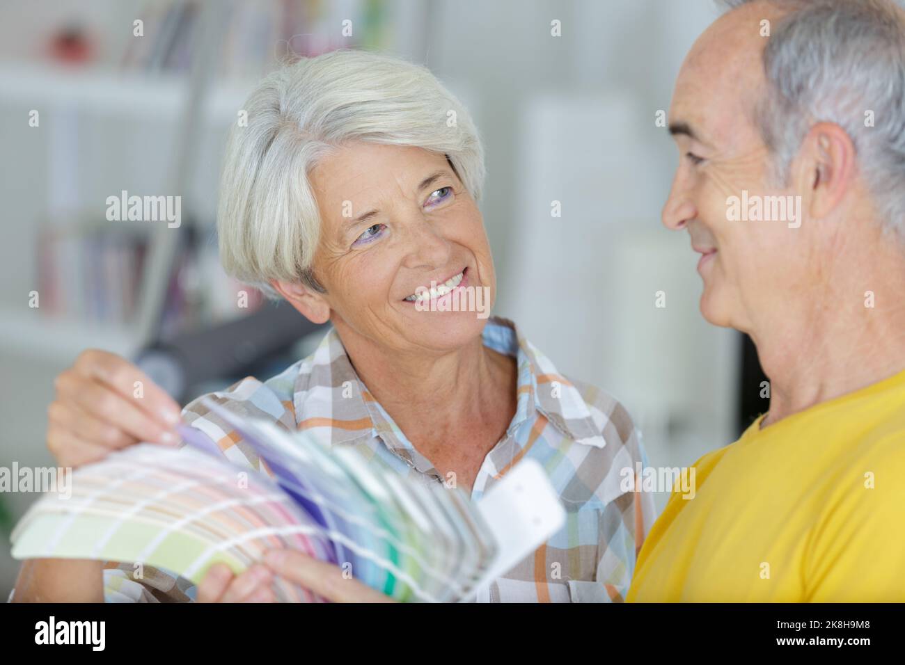 elderly couple with a color swatch Stock Photo