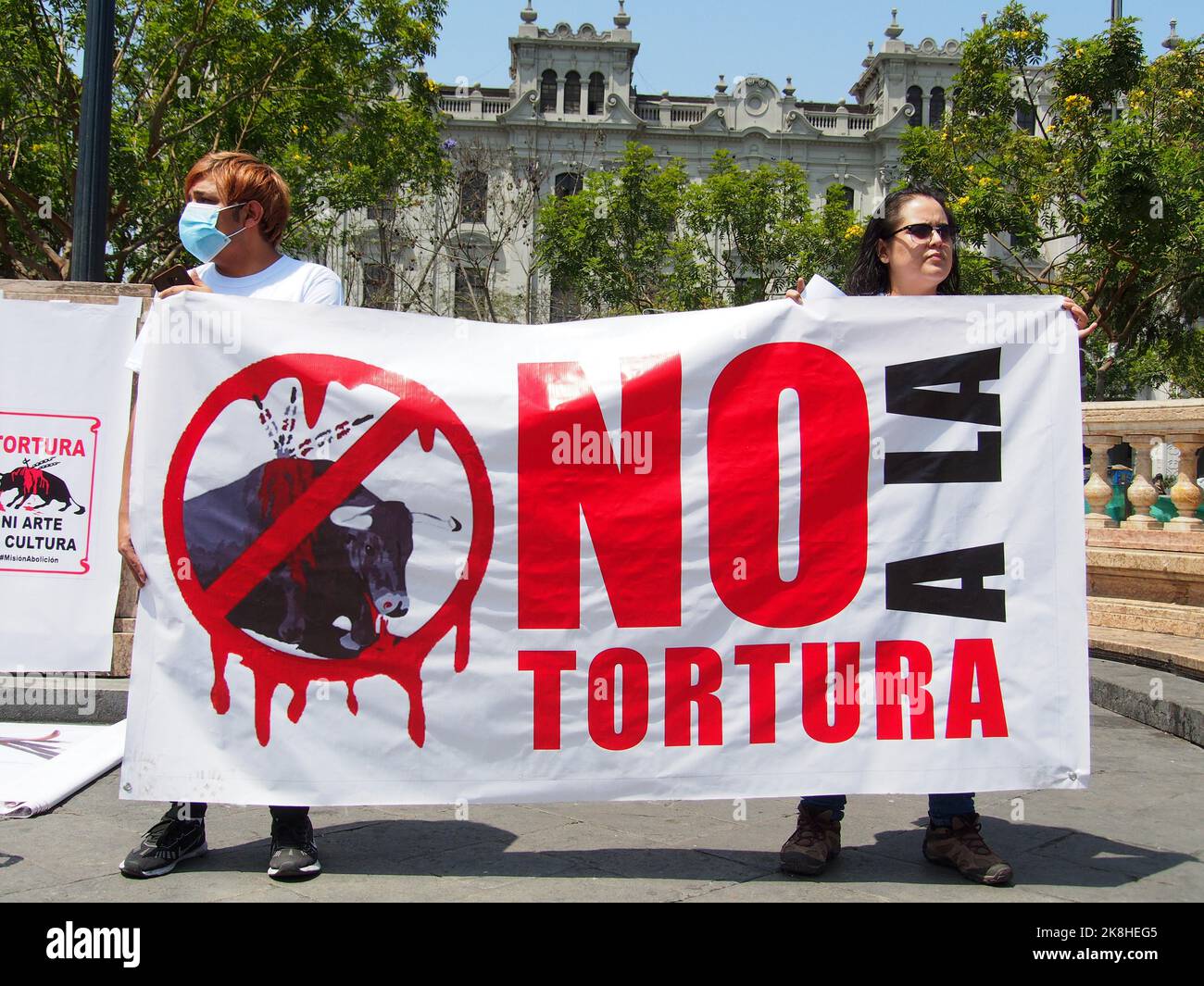 Lima, Peru. 23rd Oct, 2022. 'No to Torture' can be read on a banner when dozens of animal activists took to the streets to protest against bullfighting in the bullring of Acho, in Lima. The Plaza de Toros de Acho, inaugurated in 1766, continues to operate, despite the existence of a law against animal abuse, on the ground that bullfight is a traditional cultural spectacle. Credit: Fotoholica Press Agency/Alamy Live News Stock Photo