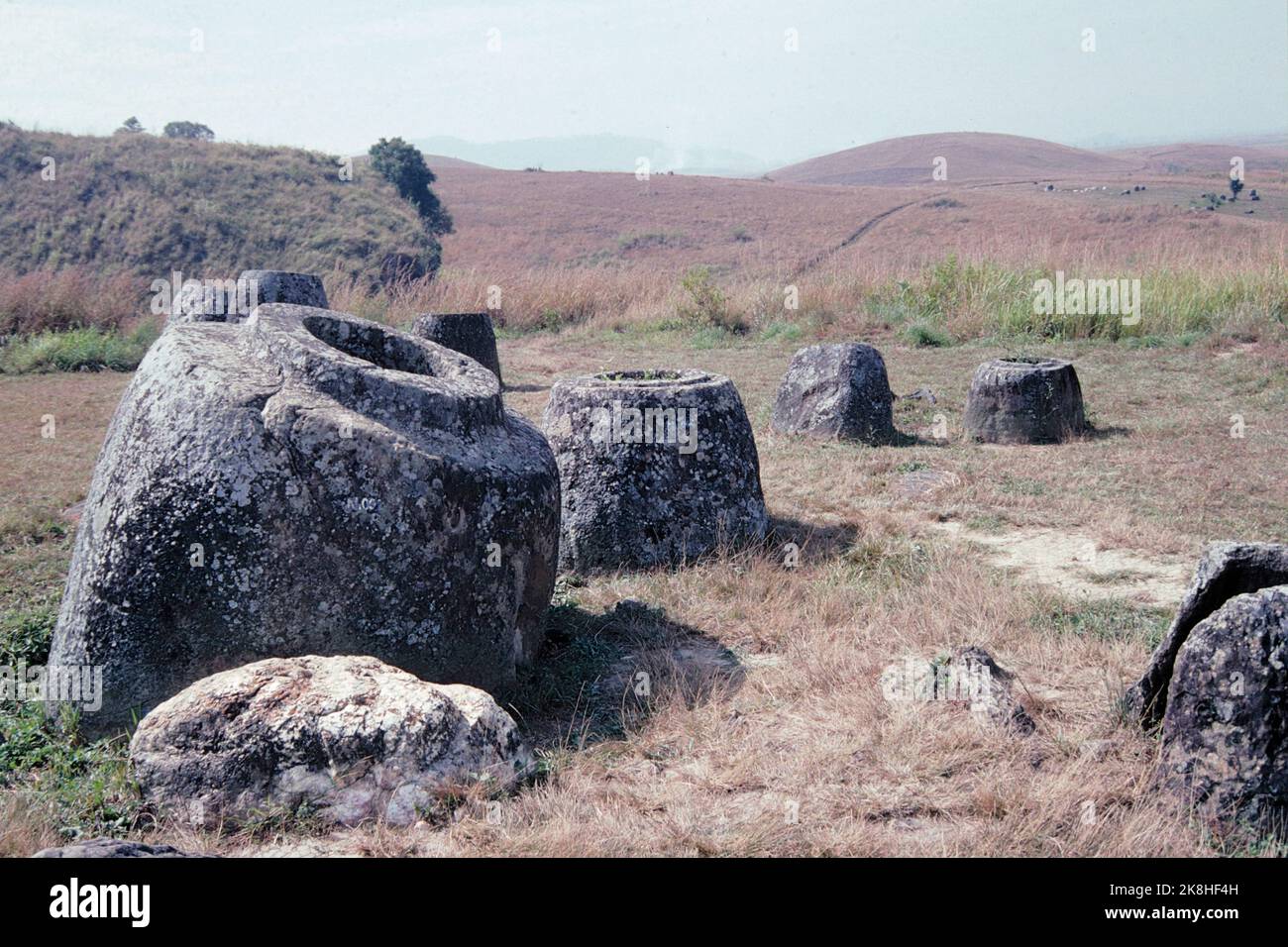 Jar megaliths at the “Plain of Jars”, Laos Stock Photo