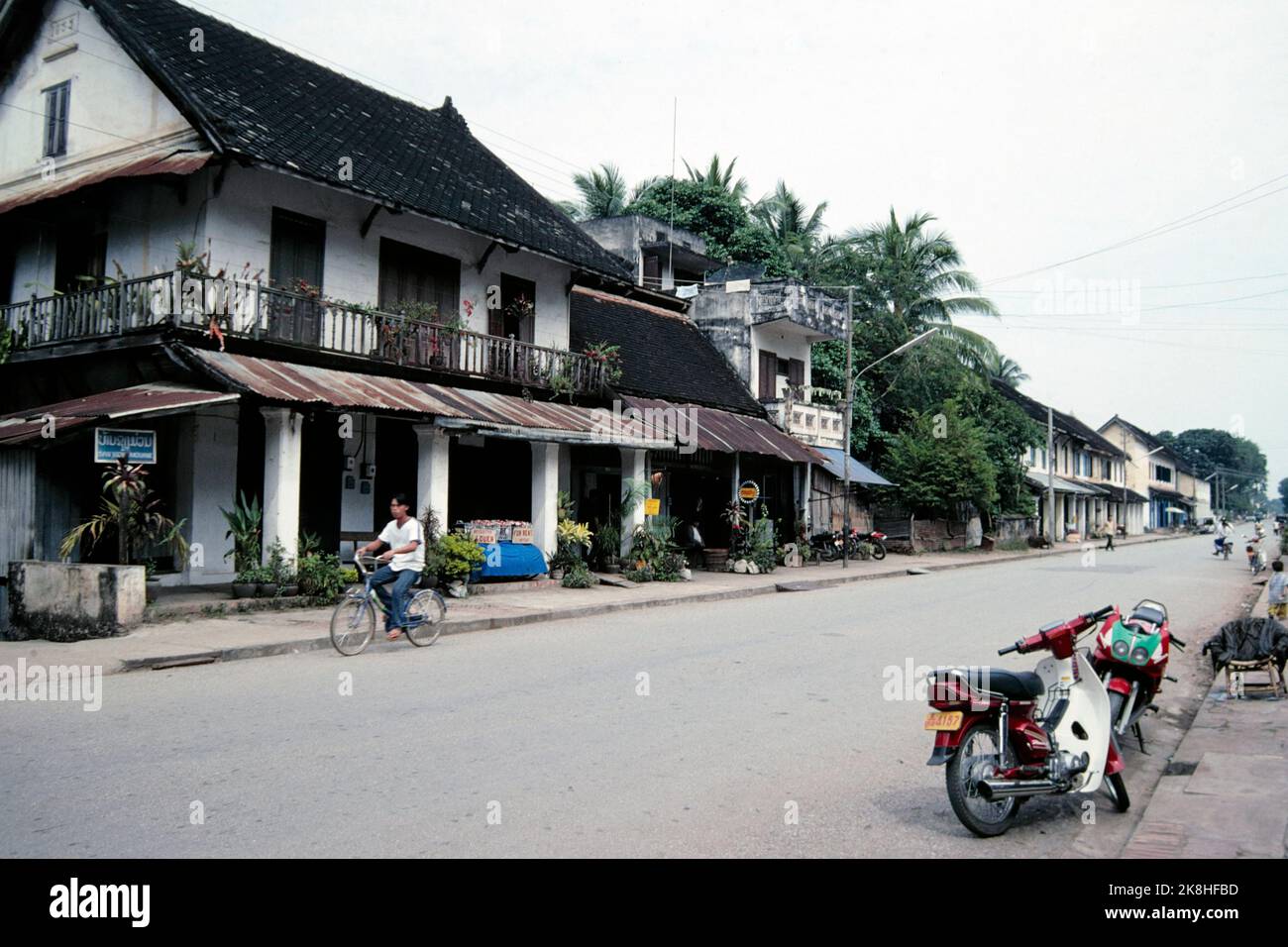Street view, French Colonial-style buildings in Luang Prabang, Laos 1997 Stock Photo