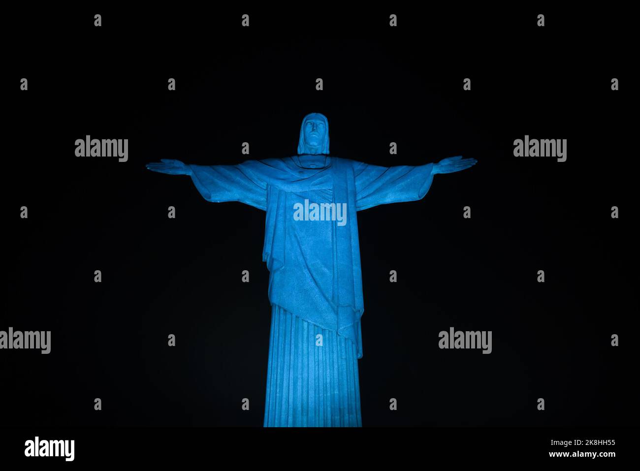 Christ the Redeemer was illuminated in light blue, on the night of this Sunday (16) in celebration of World Food Day, in the south zone of Rio de Jane Stock Photo
