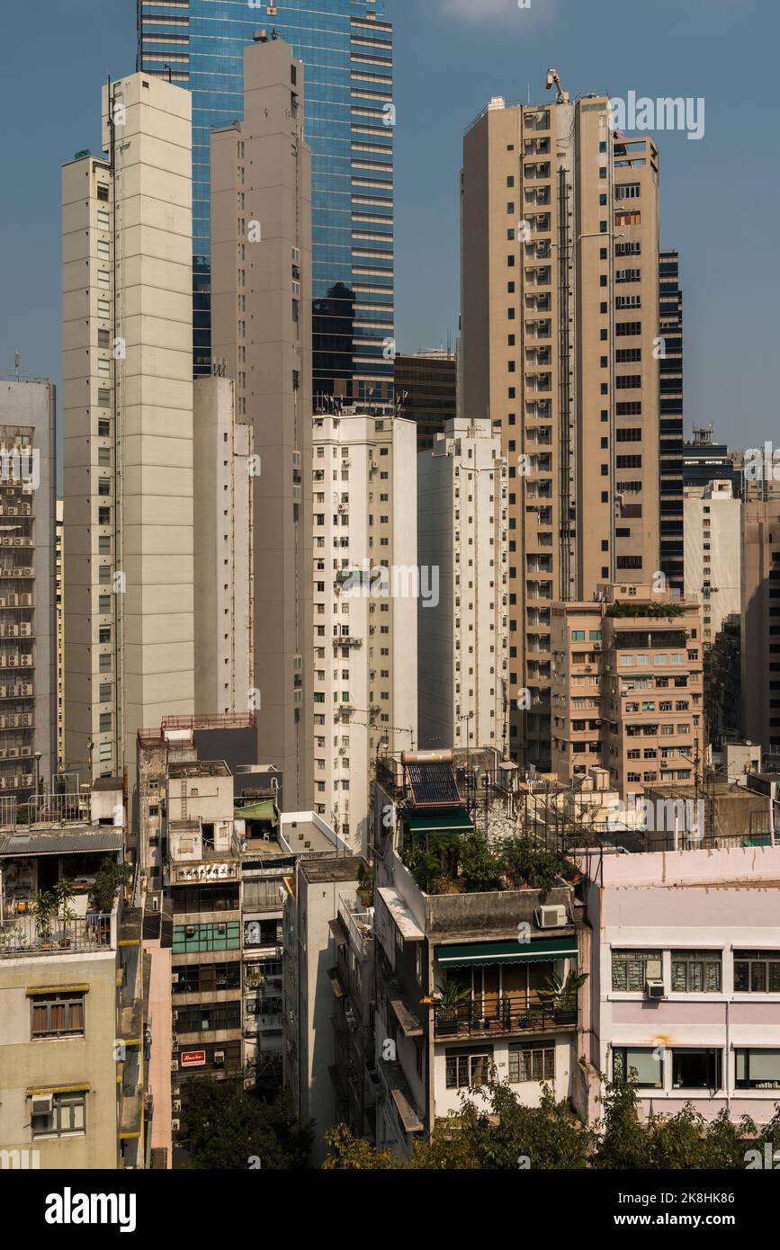 Old and new: modern high-rise office and apartment blocks behind traditional older mid-rise tenements, Central, Hong Kong Island, 2014 Stock Photo
