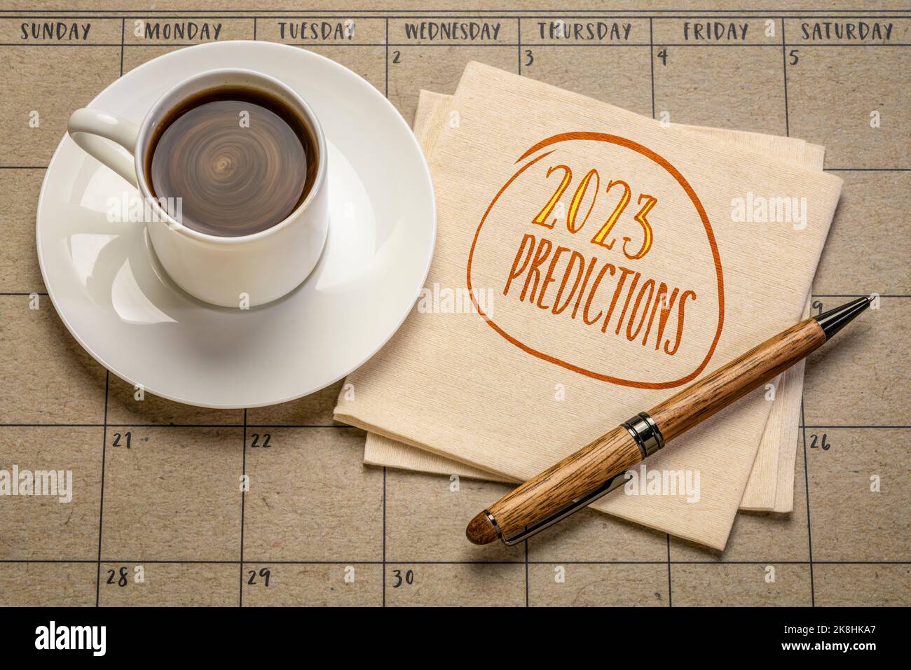 2023 predictions - handwriting on a napkin with a cup of coffee, business and financial trends and expectations in New Year Stock Photo