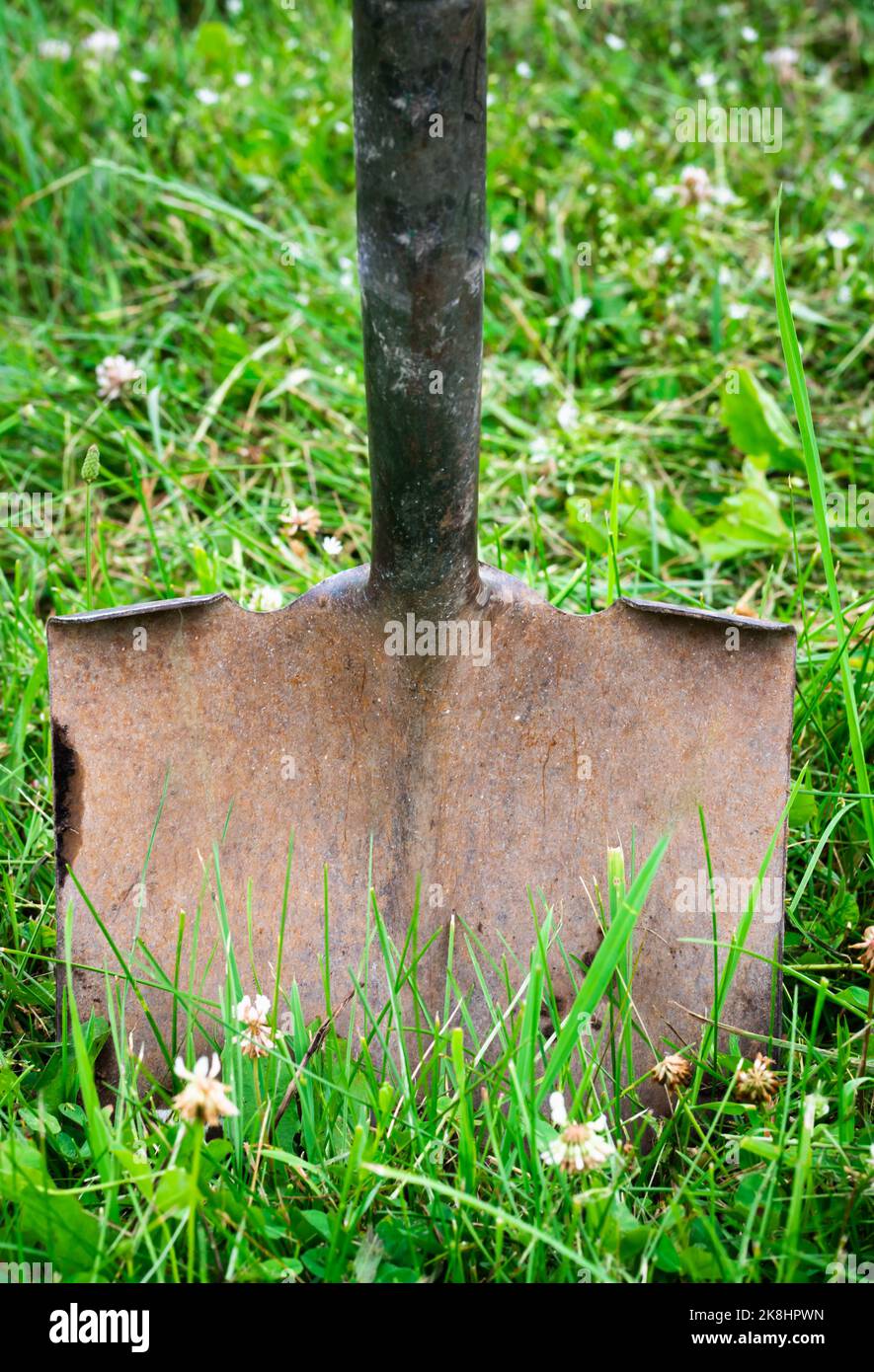 Old rusty shovel stuck ground hi-res stock photography and images - Alamy