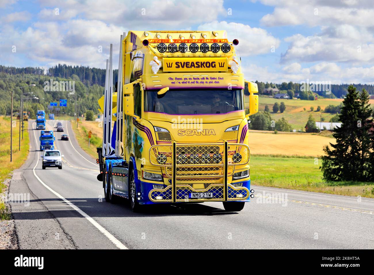 Customised Scania R650 timber truck year 2021 of Swenke Transport in truck convoy to Power Truck Show. Pirkanmaa, Finland. August 11, 2022. Stock Photo