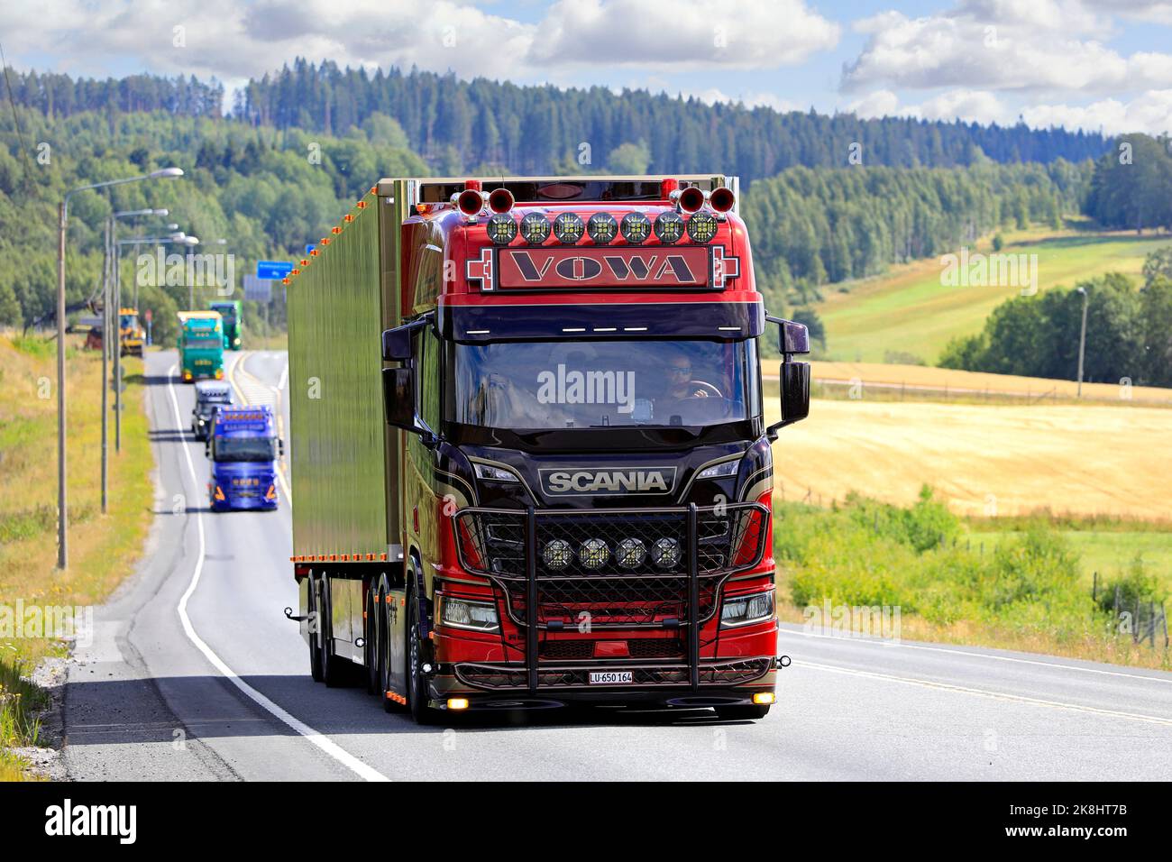Customised Scania R650 truck semi trailer of voWa Transporte, Switzerland in truck convoy to Power Truck Show 2022. Pirkanmaa, Finland. Aug 11, 2022. Stock Photo