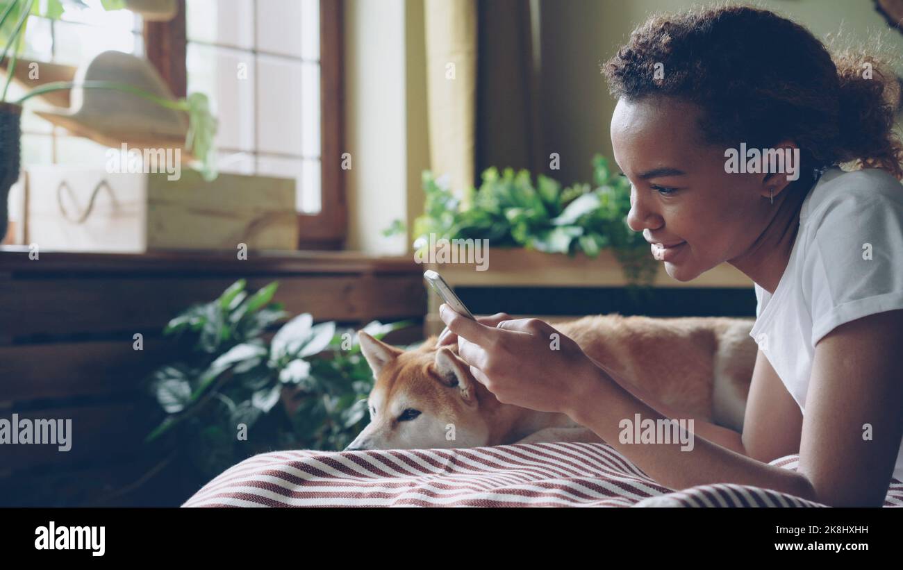 African teen girl dog hi-res stock photography and images - Alamy