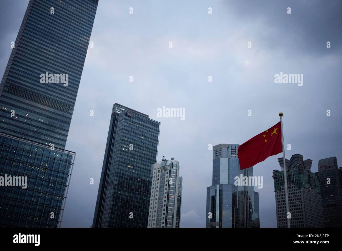 A Chinese national flag is pictured, following the coronavirus disease (COVID-19) outbreak, in Shanghai, China, October 14, 2022. REUTERS/Aly Song Stock Photo