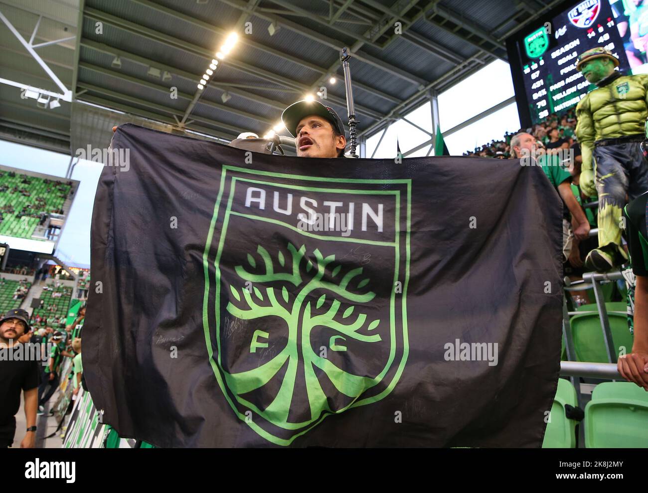 Austin Texas USA, October 23 2021: Bitcoin club members, supervised by the  range boss (left). shoot at The Range, an indoor shooting venue in south  Austin, during a club meet-up where members