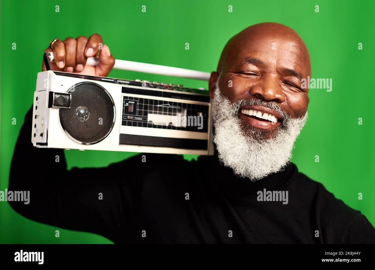 Music is what keeps us feeling young. Studio shot of a senior man