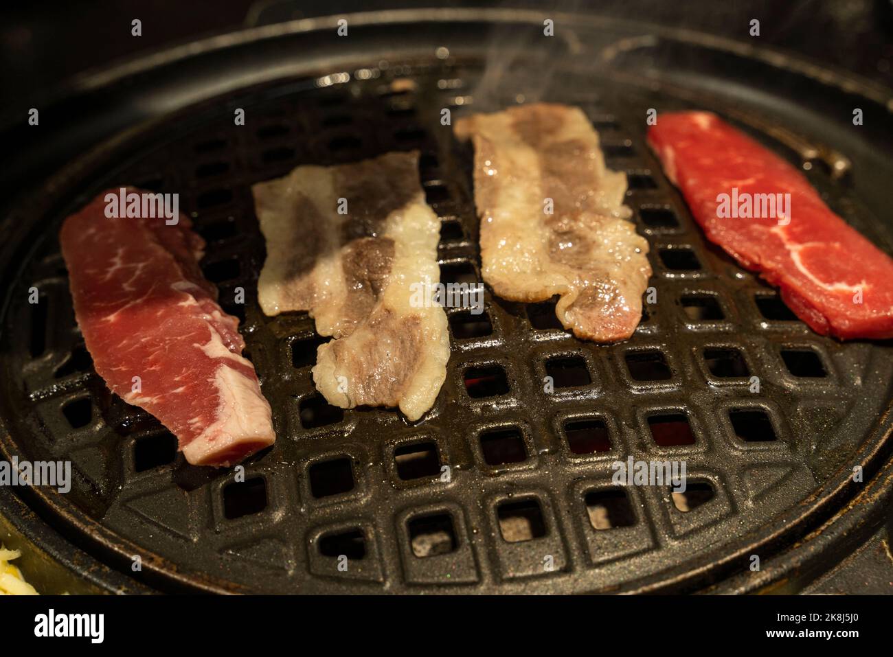 grilled meat on grill,Korean BBQ Stock Photo