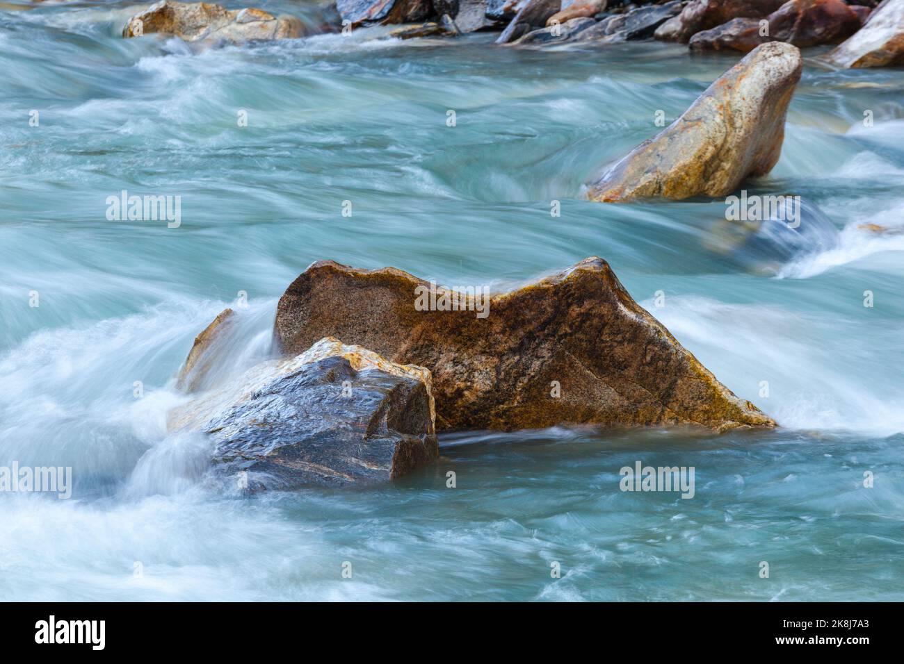 Rocks in a rapid river Stock Photo