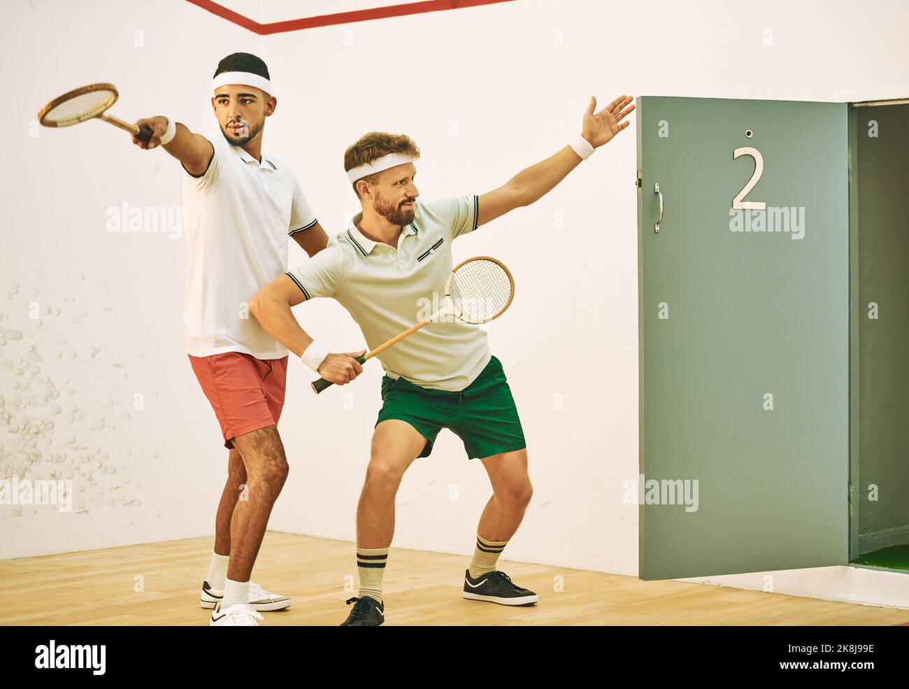 Alert the press, the squash superstars have arrived. two young men
