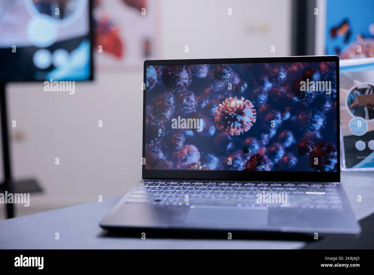 Close up of computer screen showing microscopic images of virus ...