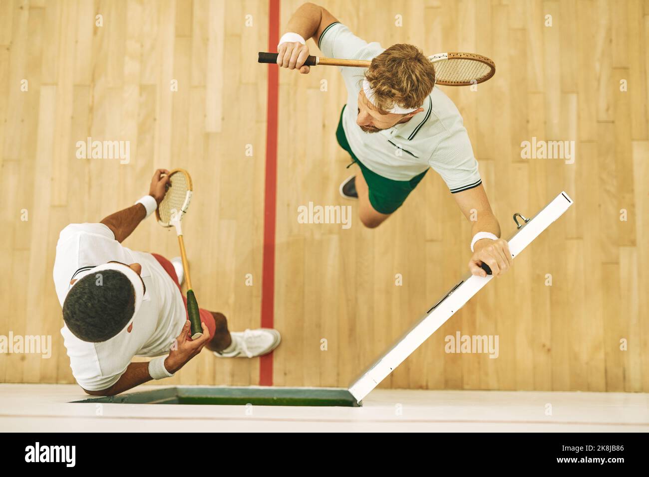 Youve met your match. High angle shot of two young men at a squash