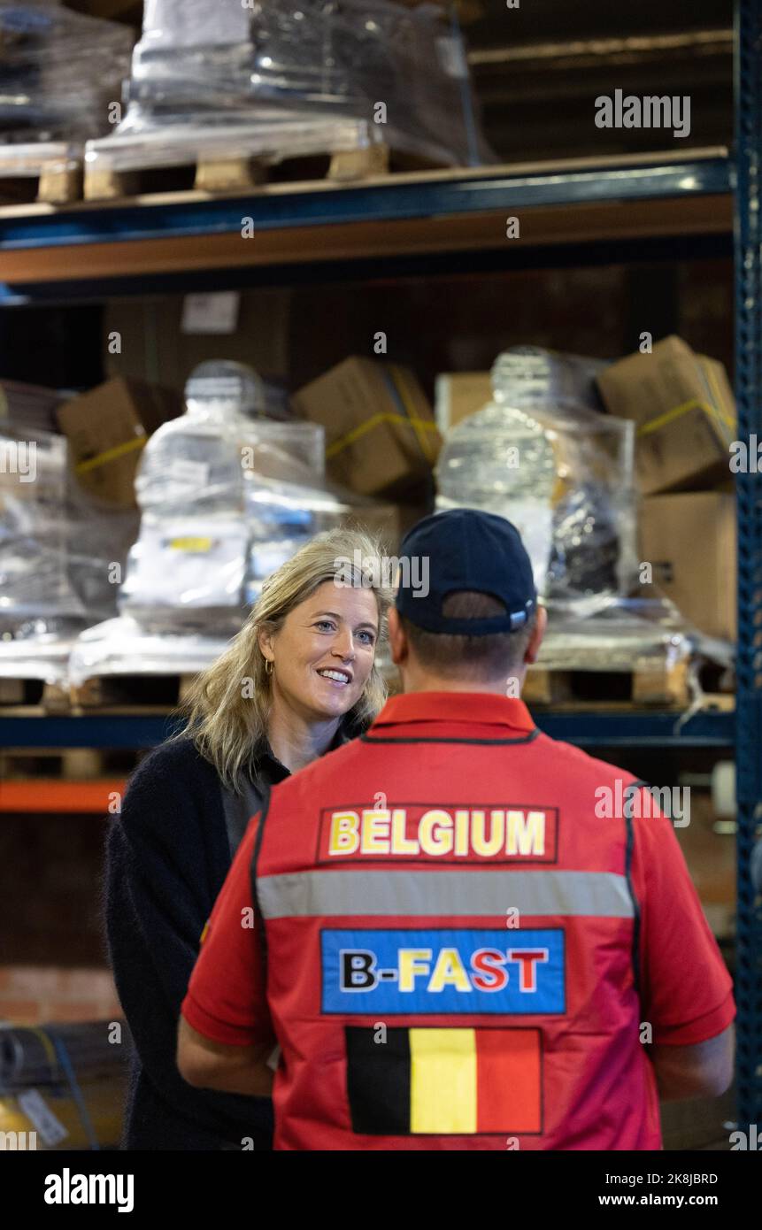 Interior Minister Annelies Verlinden pictured during a meeting with the volunteer convoy of Belgian governmental aid organisation B-Fast (Belgian First Aid and Support Team), ahead of their departure to Pakistan, on Monday 24 October 2022, at the Major Housiau base in Peutie, Vilvoorde. The B-Fast team will provide assistance after this summer's severe flooding in Pakistan. BELGA PHOTO BENOIT DOPPAGNE Stock Photo