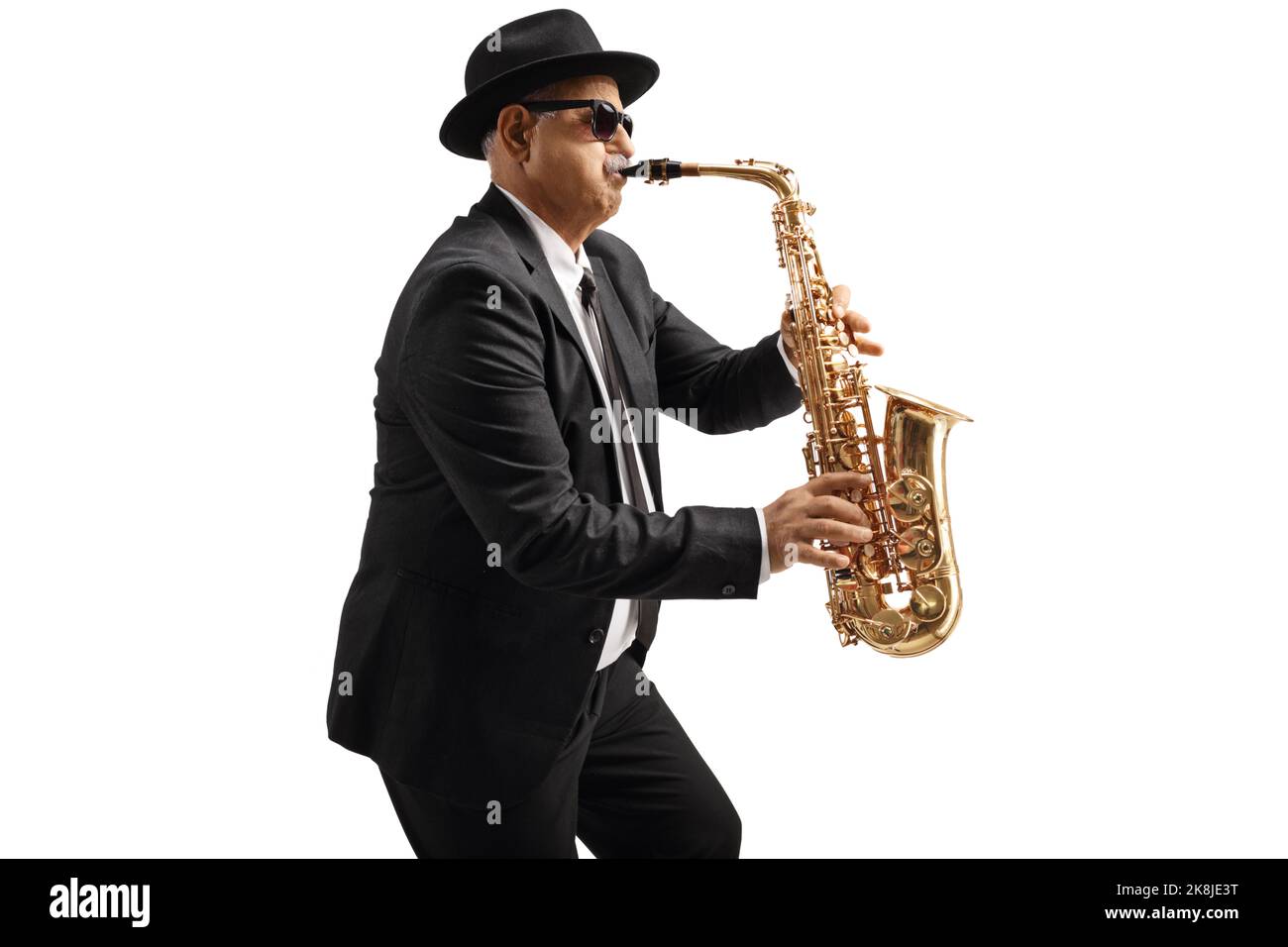 Mature male sax player with sunglasses performing isolated on white