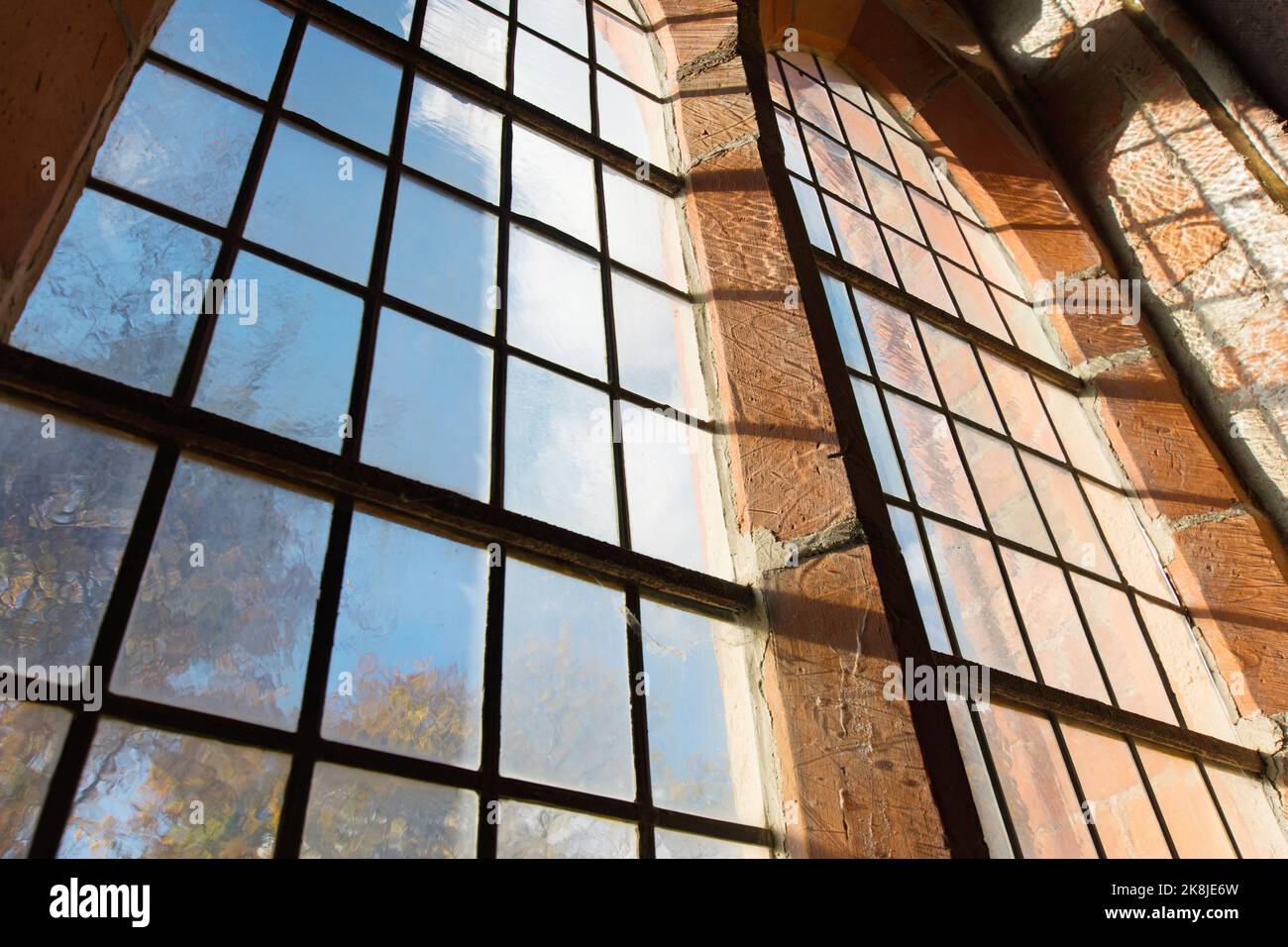 Light shines through a monastery window Stock Photo