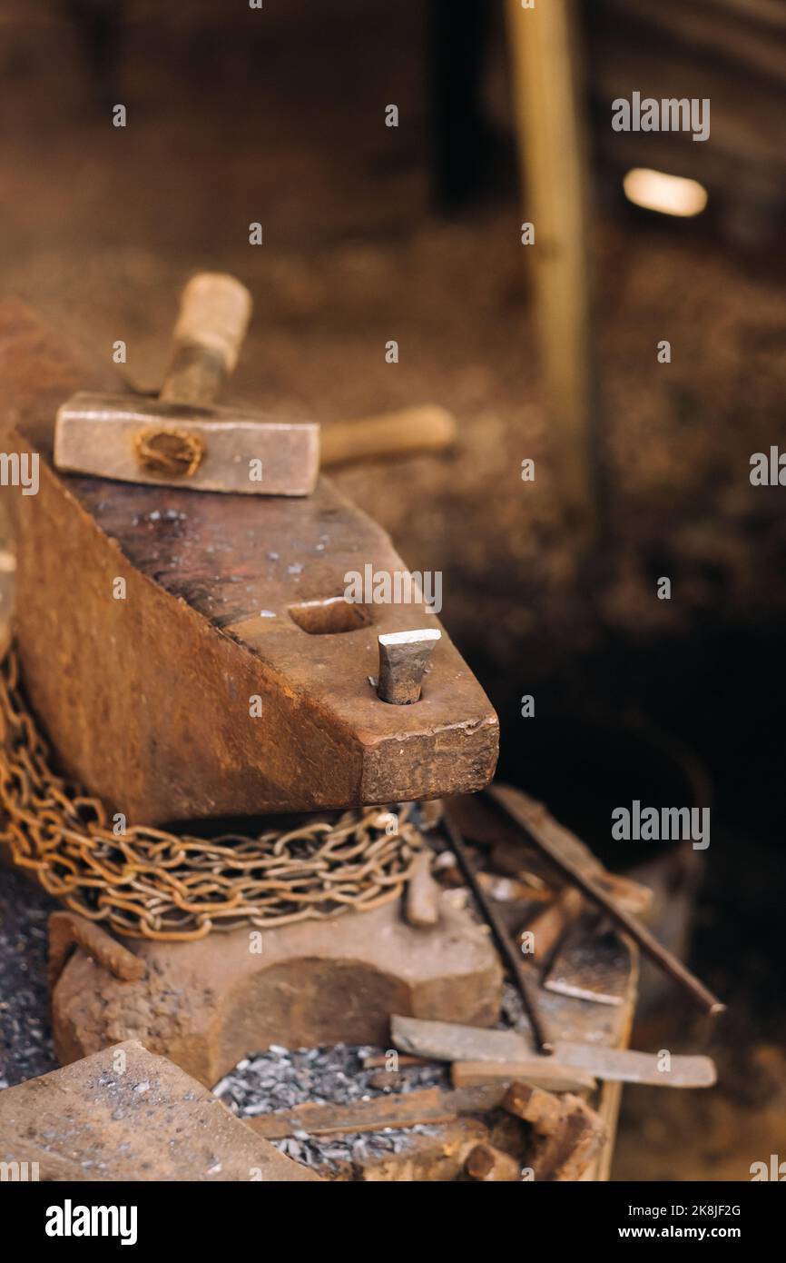 hammer on an anvil standing on the street Stock Photo Alamy