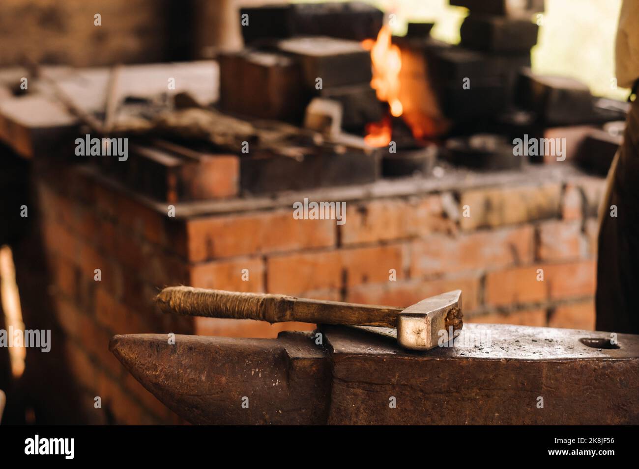 hammer on an anvil standing on the street Stock Photo Alamy