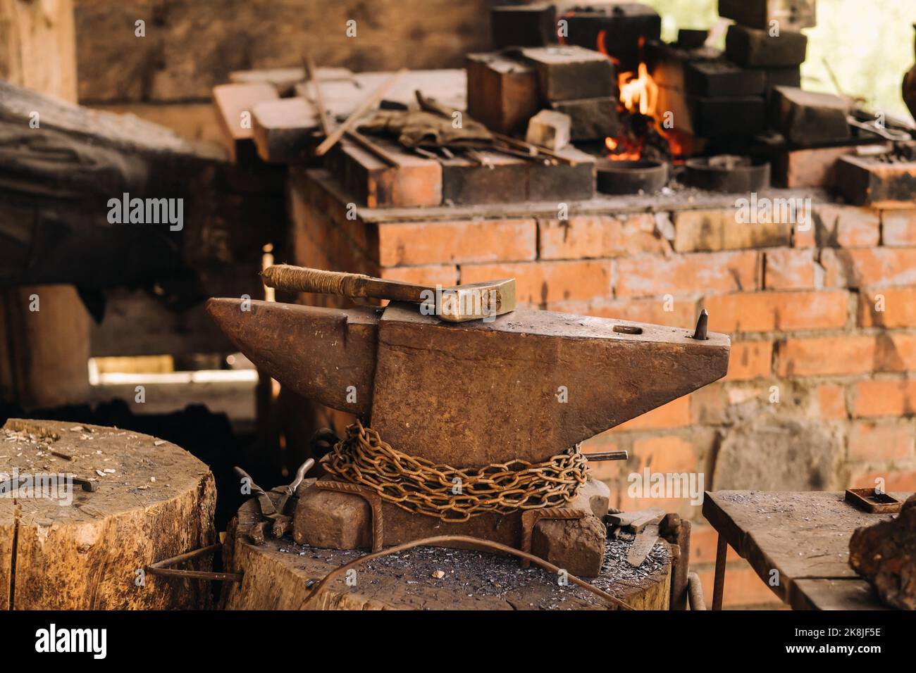 hammer on an anvil standing on the street Stock Photo Alamy