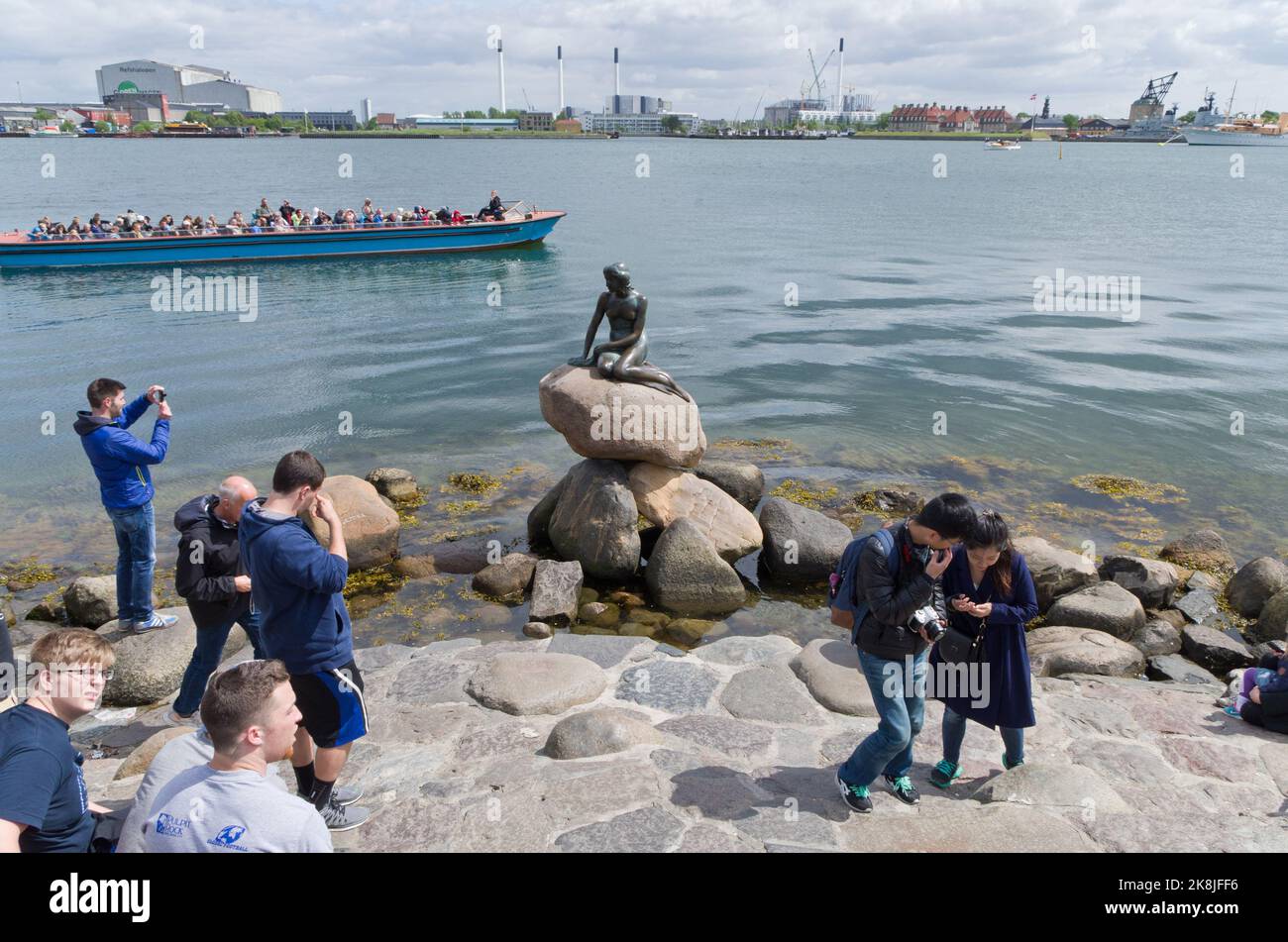 Crowds of visitors at the Little Mermaid statue on the waterfront