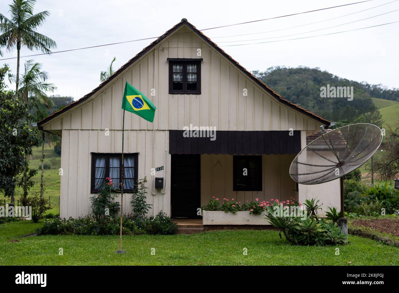 Pomerode, Brazil. 27th Sep, 2022. The Brazilian flag flies in front of a house in the South American country's 'most German city.' (to dpa 'Brazil's most German city hopes for Bolsonaro's re-election') Credit: Henry Milleo/dpa/Alamy Live News Stock Photo