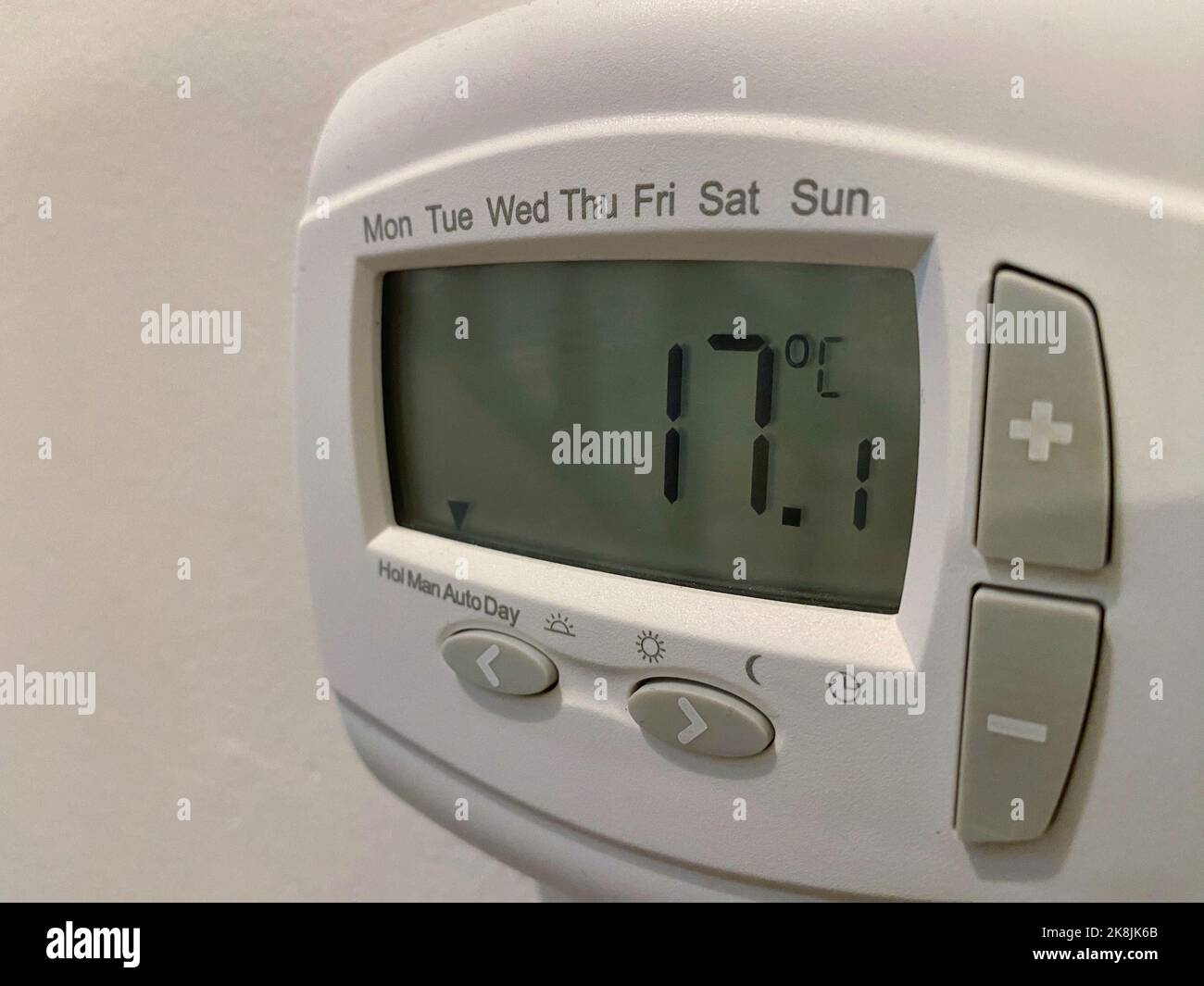 Central heating thermostats on a wall Stock Photo - Alamy