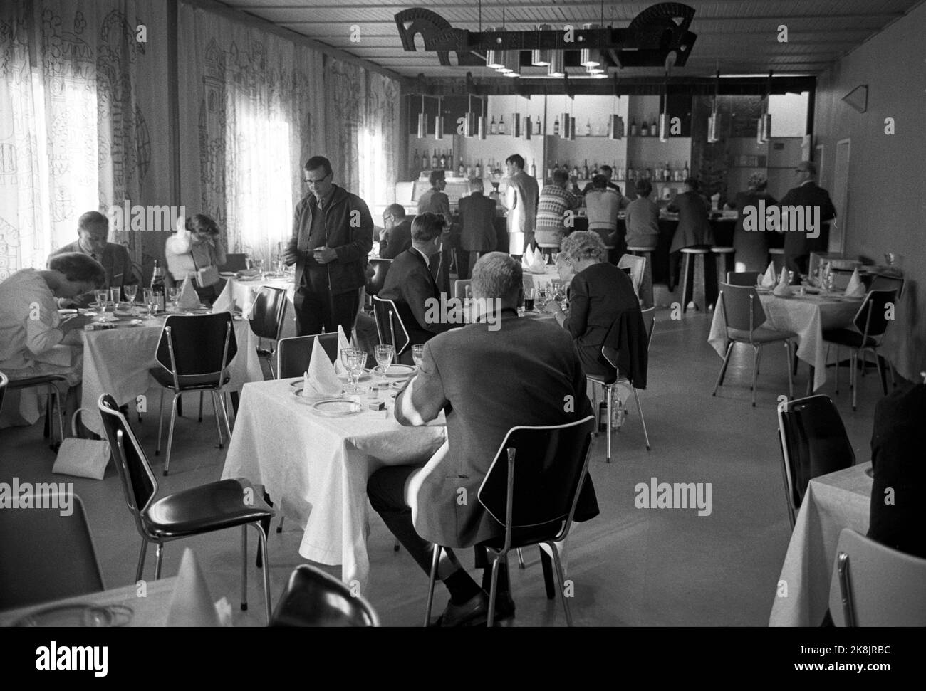 Boris Gleb, Soviet April 1965. 'Russian tourist weapons: Vodka'. Visa -free access to the Soviet Union. Boris Gleb can tempt with an art exhibition, cinema and visits to the power plant, but the foremost lure is Vodka. From the restaurant / bar in the barracks building in Boris Gleb where Norwegians in addition to consumption on site can bring a bottle of cheap liquor home Photo: Sverre A Børretzen / Current / NTB. Stock Photo