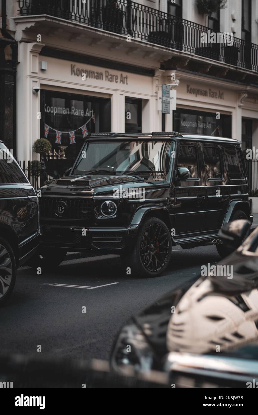 A vertical shot of a Mercedes G Brabus parked in the city of London ...
