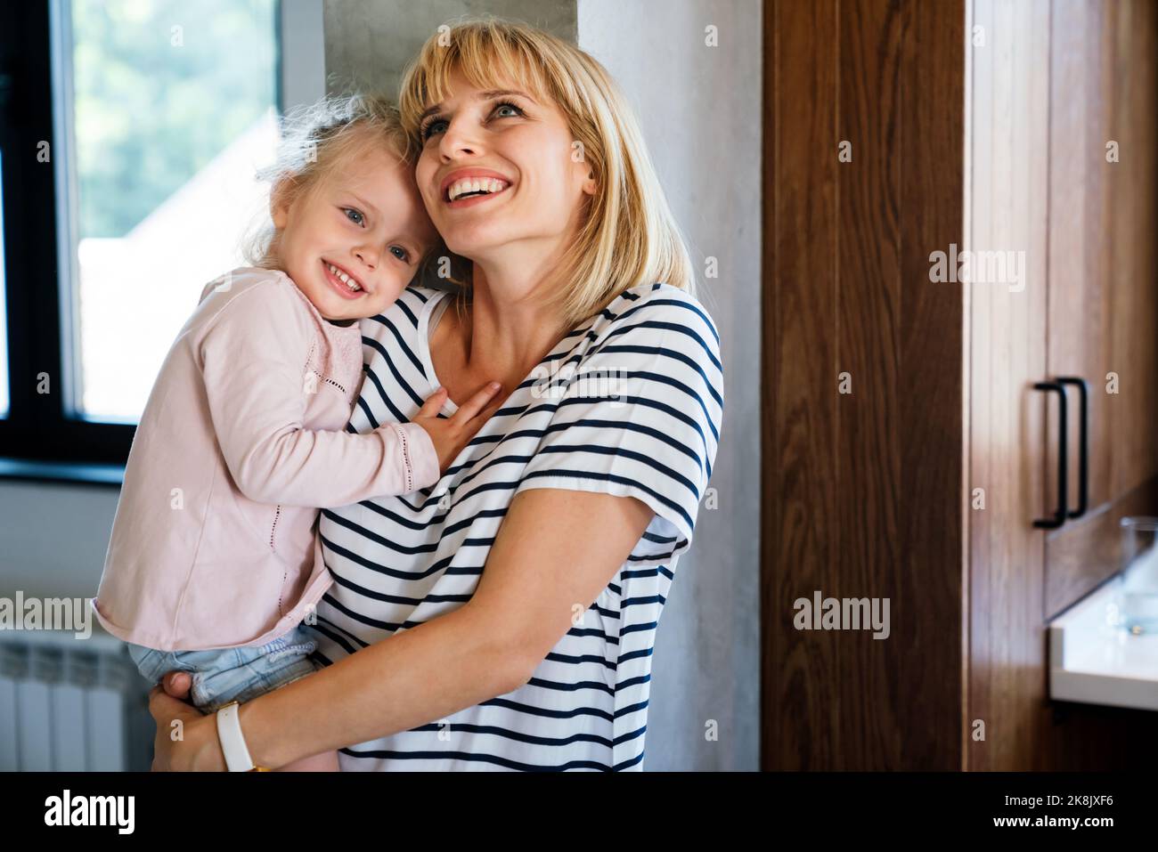 Single mother concept. Happy mother with her little girl spendig time