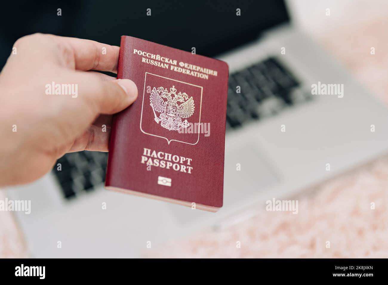 Russian foreign international passport in the hand citizen. Russian