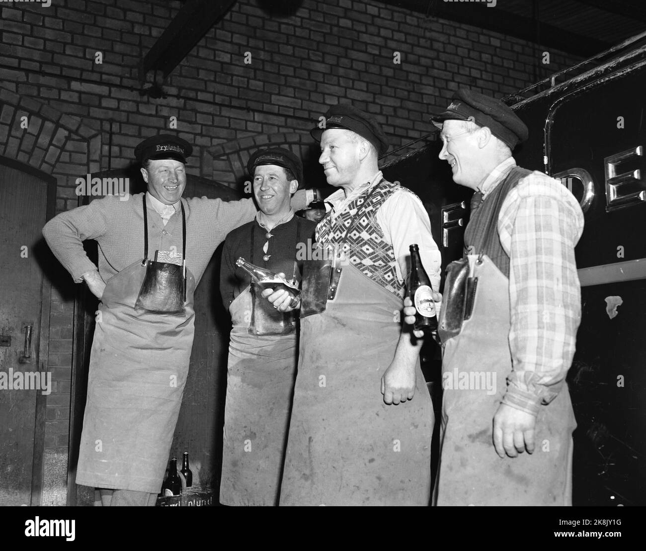 Oslo 1951. Breweries in Oslo in 1951. Here are some of the drivers who strengthen with a beer before delivering beer to shops and restaurants in the Oslo area. Photo: Sverre A. Børretzen / Current / NTB  Breweries in oslo in 1951. Pictured are some of the drivers enjoying a beer before starting their delivery rounds to shops and restaurants in the oslo area. Photo: Sverre A. Børretzen/ Current/ NTB Stock Photo