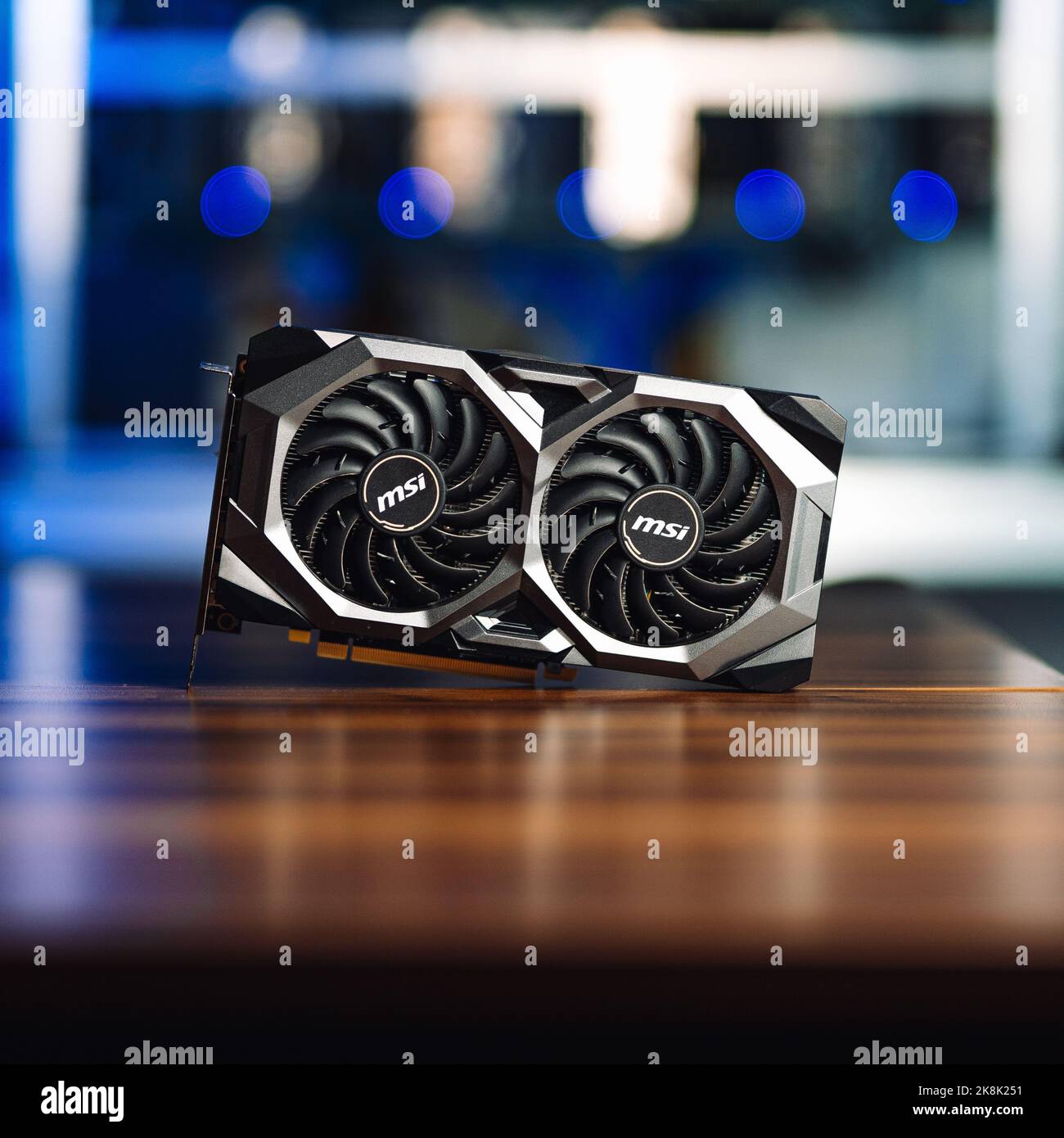 A Cryptocurrency mining GPU rig computer graphics card on the table, close-up Stock Photo