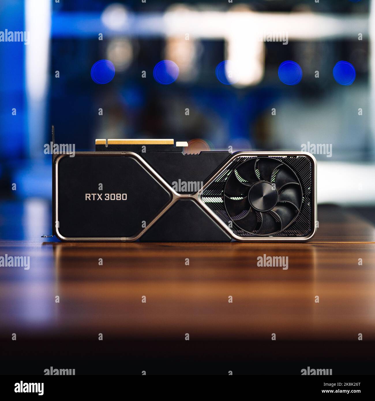 A Cryptocurrency mining GPU rig computer graphics card on the table, close-up Stock Photo