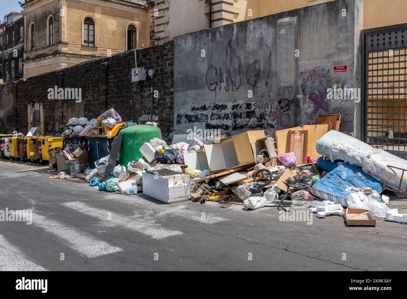 A huge heap of domestic refuse on a street in Catania, Sicily, Italy. Proper waste disposal is a