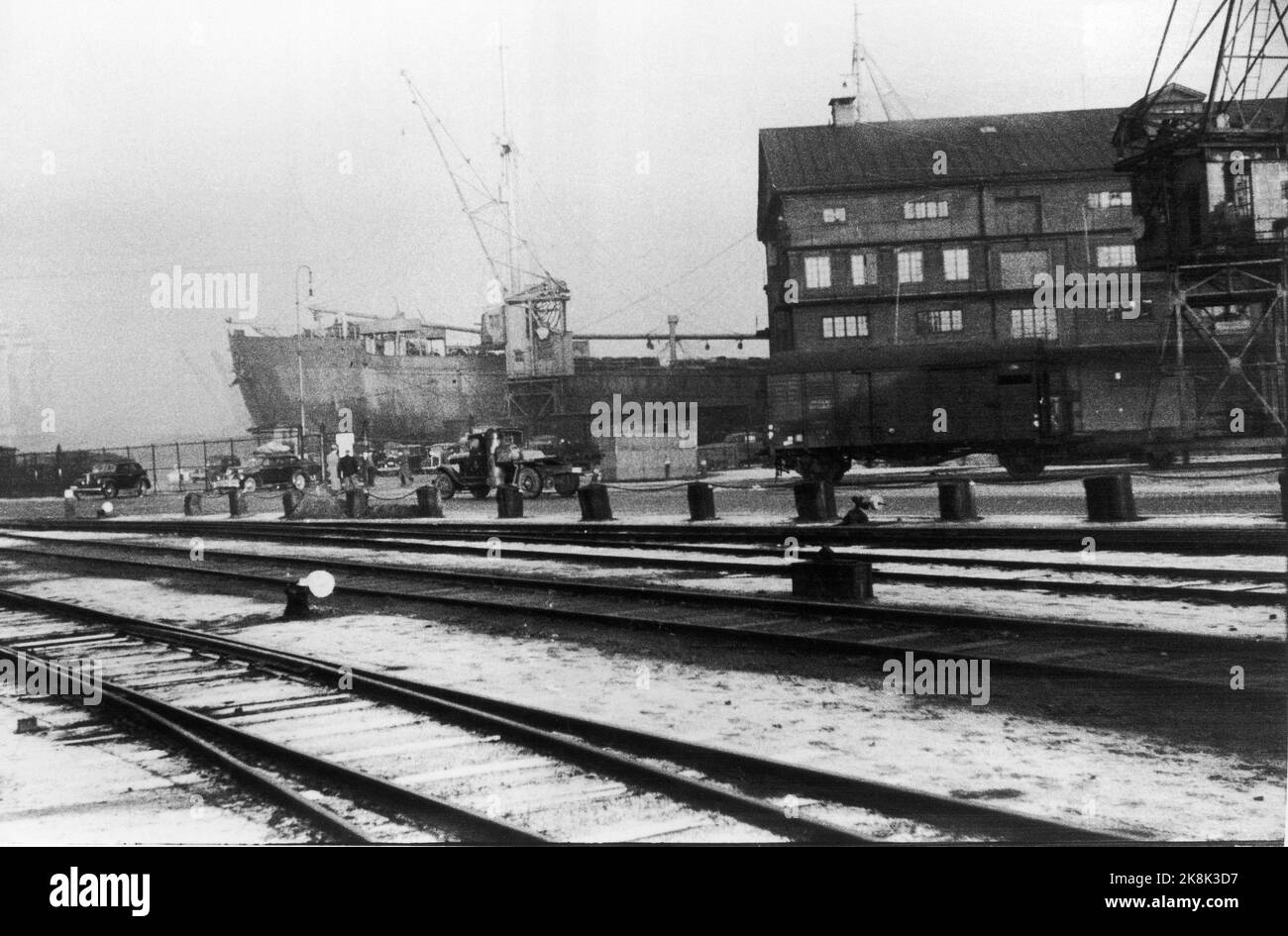 Oslo 19421126. The German ship Danube took 530 Norwegian Jews to the extermination camps. In the picture you see the boat and the American line's old buildings. The Jews were driven to the Port of Oslo with taxis, railway wagons and trucks (see picture) The men came in railway wagons (caravan) from Berg prison camp outside Tønsberg, where they had been approx. one month. Women and children were driven in taxis. 767 were deported. Only 30 survived. Compared to other countries, such as Denmark, few Jews were rescued ...... Photo: Georg W. Fossum / NTB  NB: OK for sale. Billed on Fossum Stock Photo