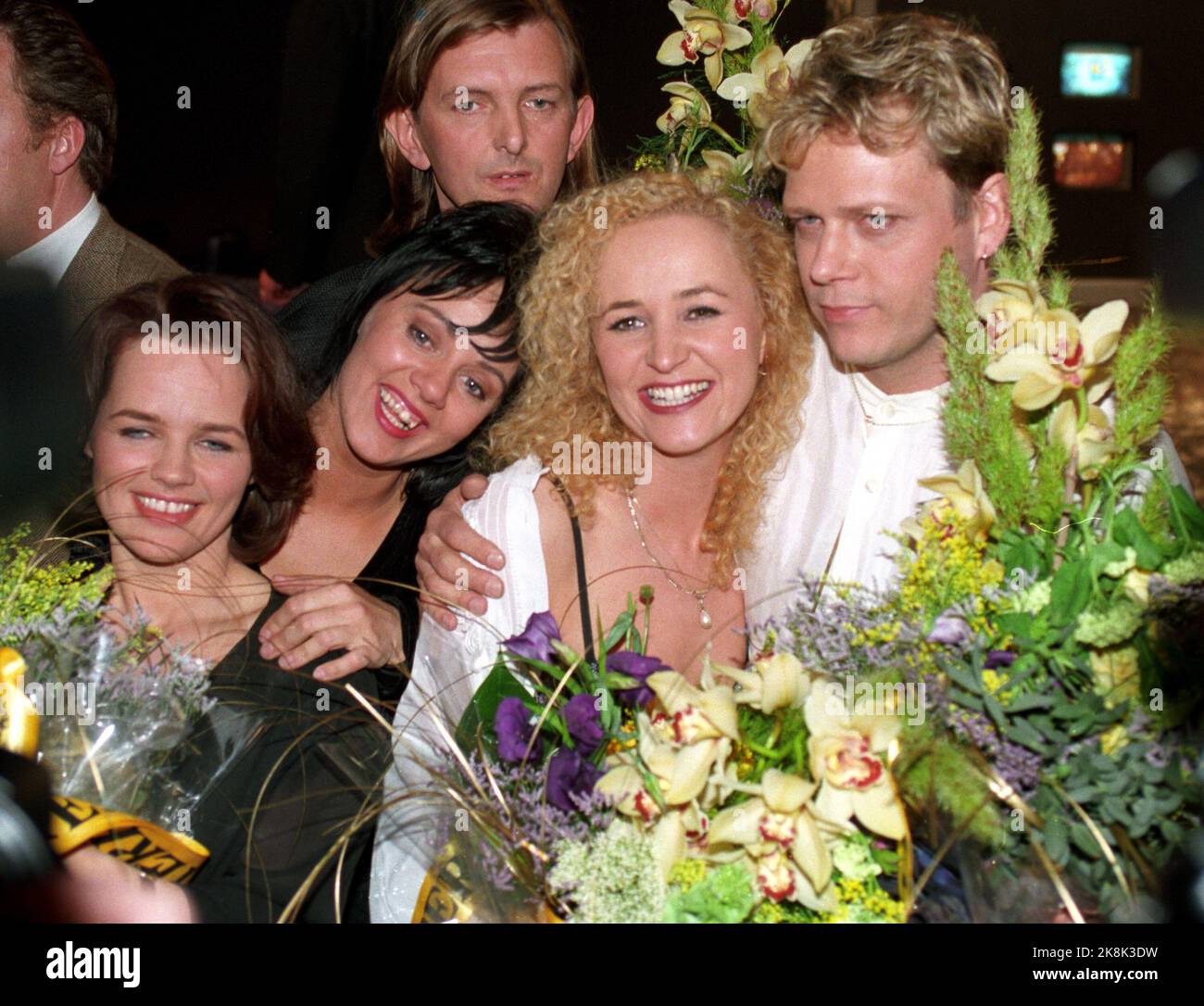 Dublin 19950513. Melody Grand Prix, the international final. Norwegian victory with the group Secret Garden and the Melody 'Nocturne'. Fionnuala Sherry and Rolf Løvland on stage after victory, with flowers etc. Photo: Per R. Løchen / NTB Stock Photo