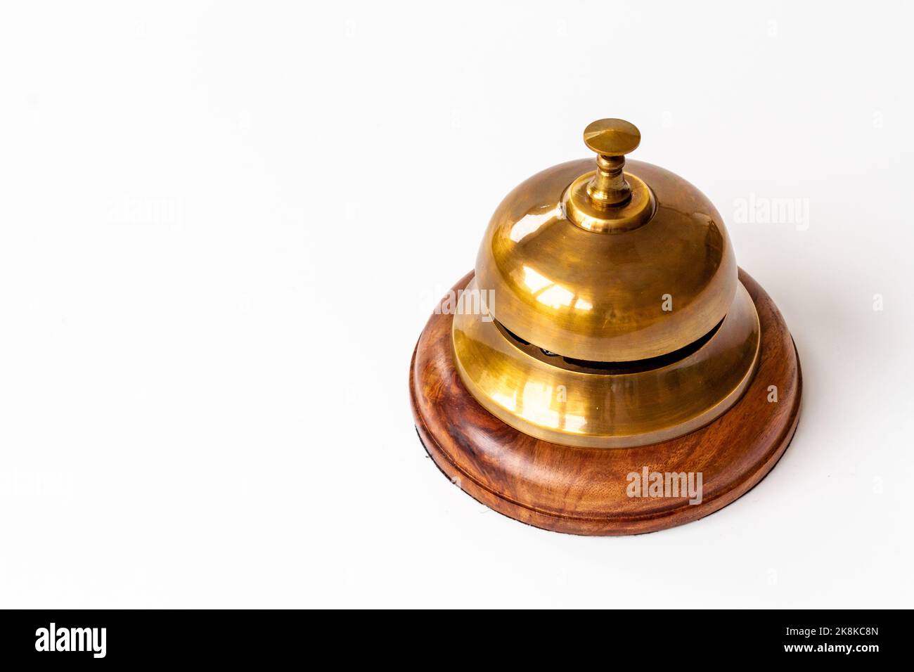 Close up of hotel golden service bell. Attention concept Stock Photo